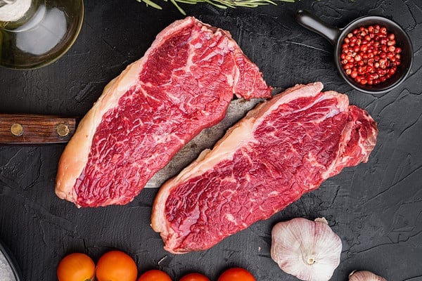 New York Strip vs. Sirloin: 3 Key Differences & Nutritional Comparison