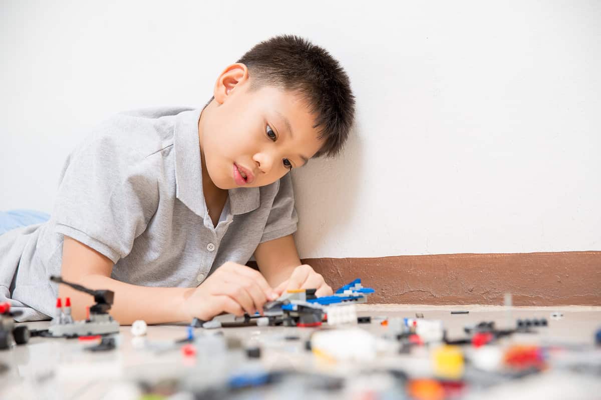 Young boy playing with blocks