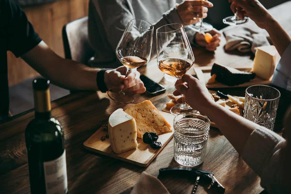 Wine and cheese served for a friendly party in a bar or a restaurant.