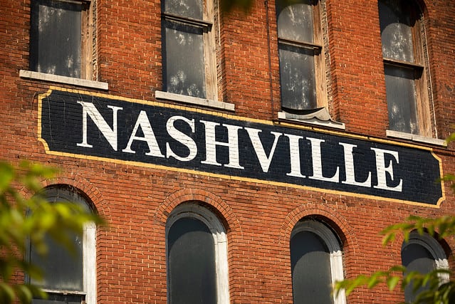 City of Nashville Tennessee USA sign painted on the side of a brick building