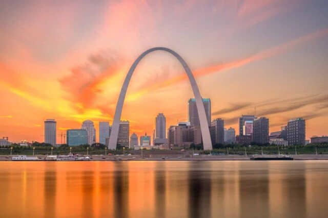 St. Louis, Missouri, USA downtown cityscape on the river at dusk.