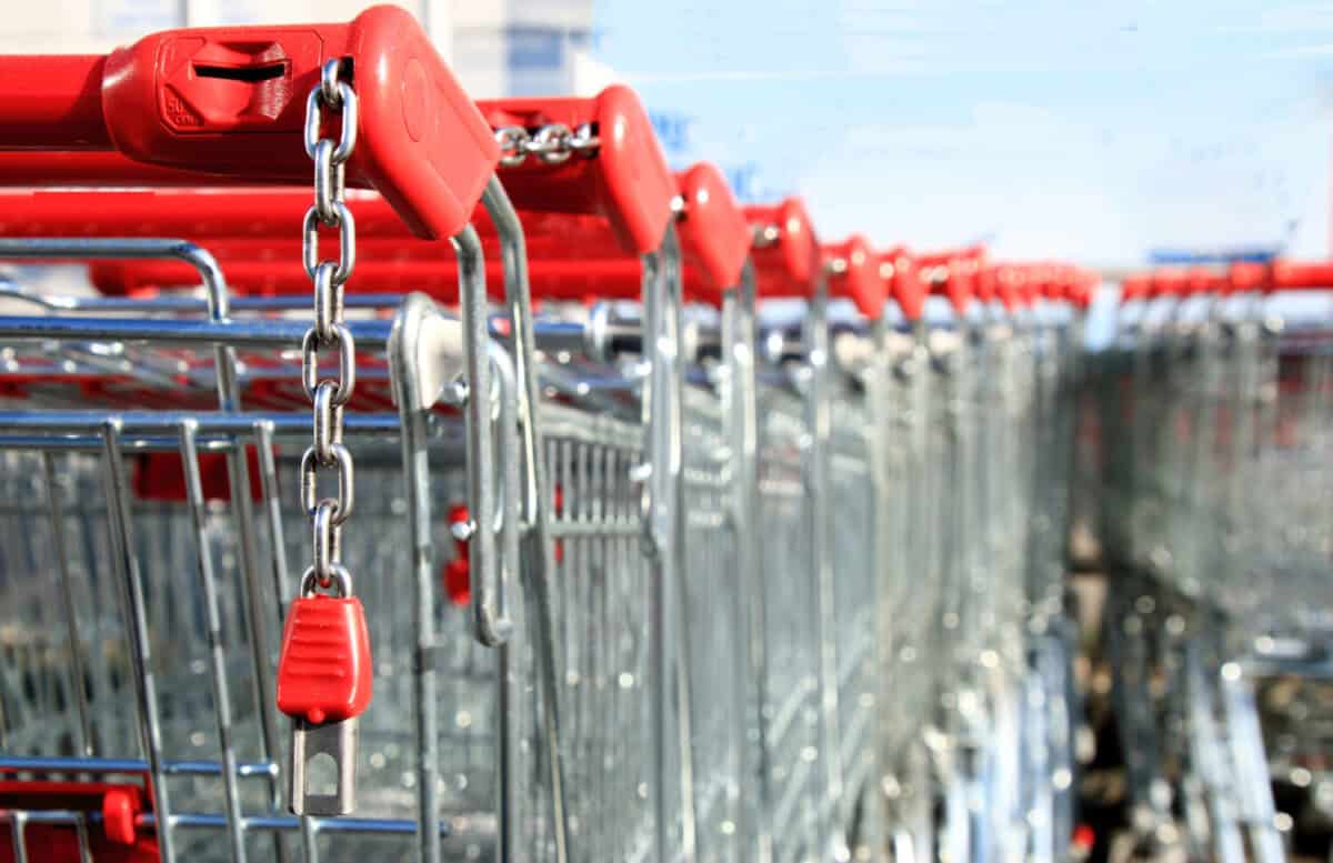 Red shopping carts for shopping in a line