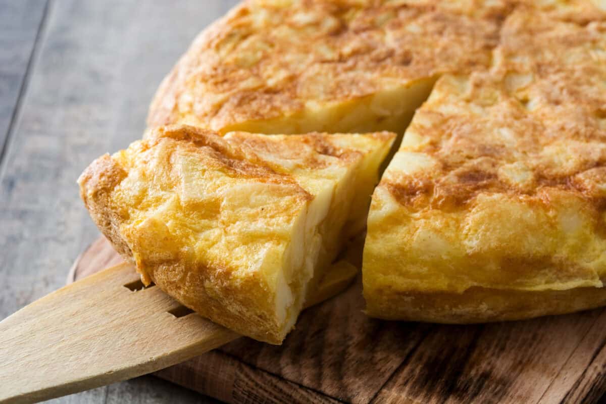 Traditional spanish omelette on wooden table