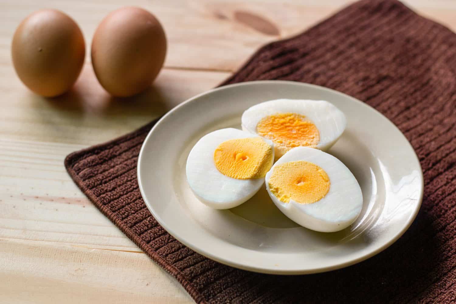 boiled eggs in plate.It full of protein and cholesterol.