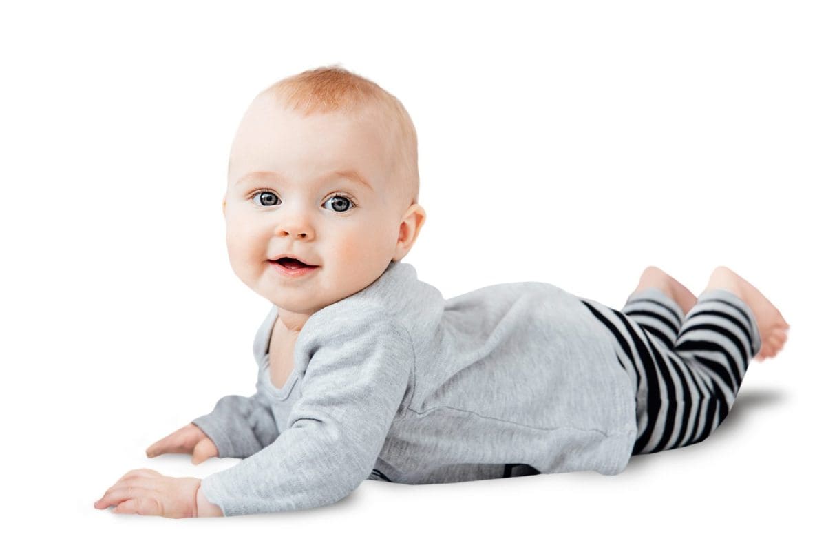 Seven month old baby child sitting on white background isolated with clipping path. Cute smiling little infant girl. Charming blue eyed baby. Copy space.