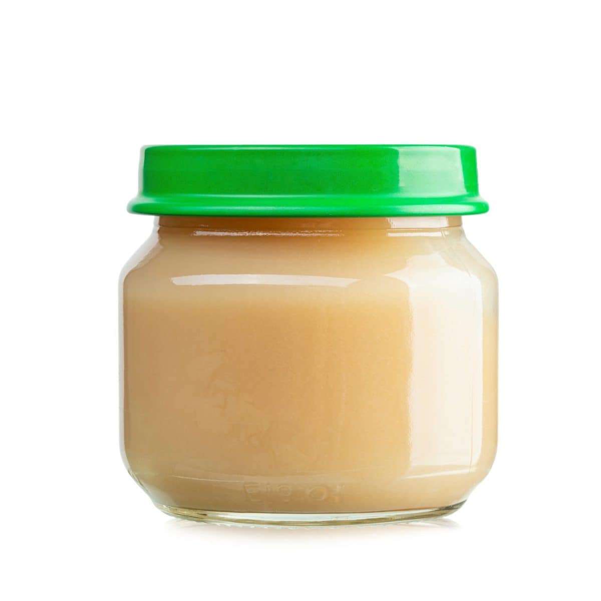Jar with yummy baby food isolated on white background. Baby puree. File contains clipping path. Treatment options for a constipated baby