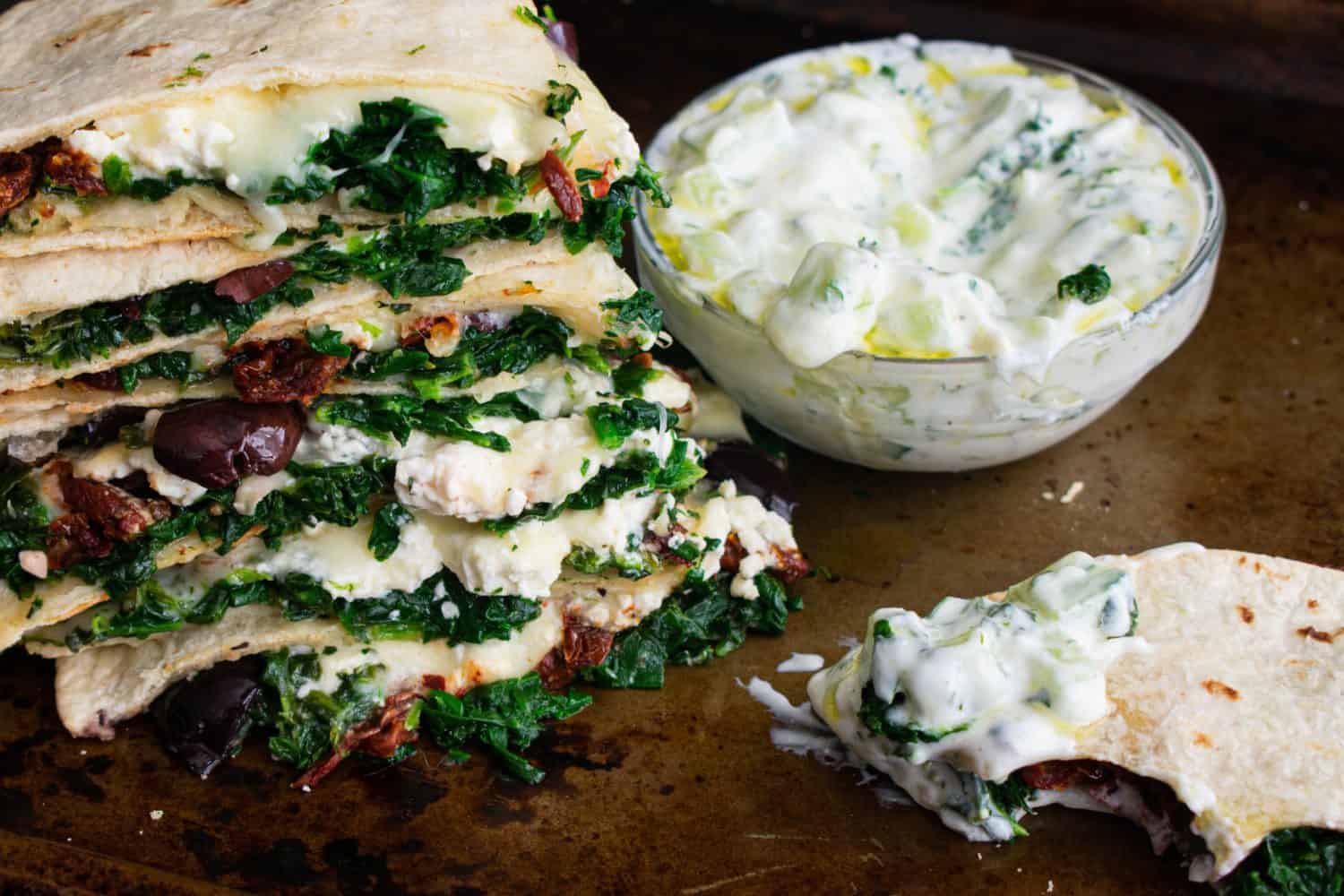 Sheet pan Quesadillas with Tzatziki Sauce: Greek and Tex-Mex fusion cuisine using ingredients for spanakopita and quesadillas