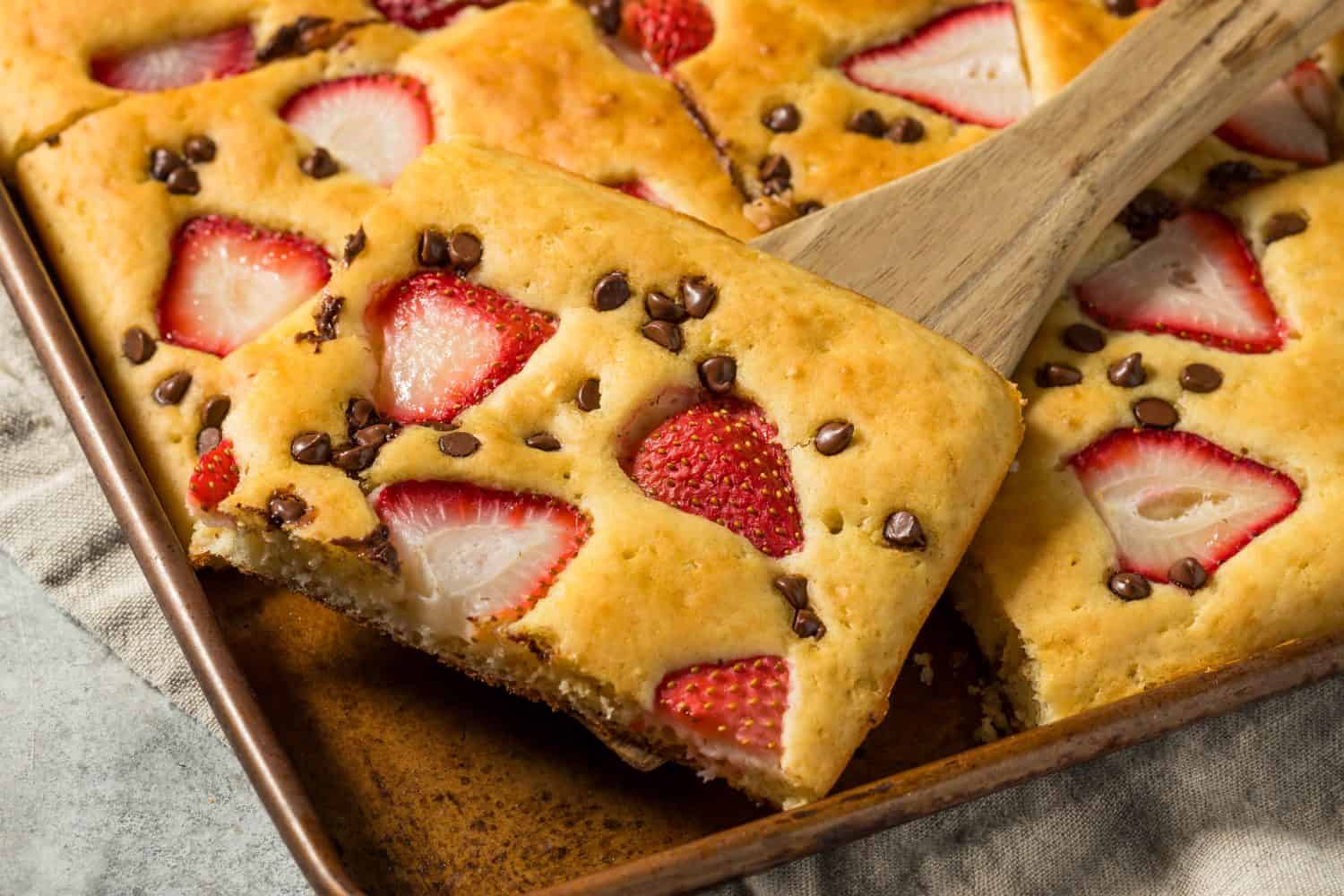 Homemade Baked Sheet Pan Pancakes with Strawberries and Chocolate