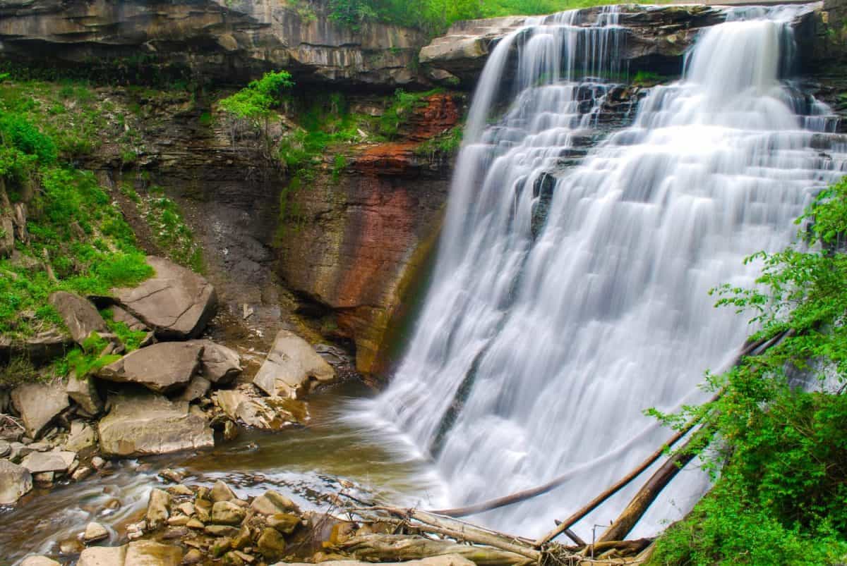 Brandywine Falls in Cuyahoga Valley National Park, Ohio in summer. 5 U.S National Parks all families should visit at least once.