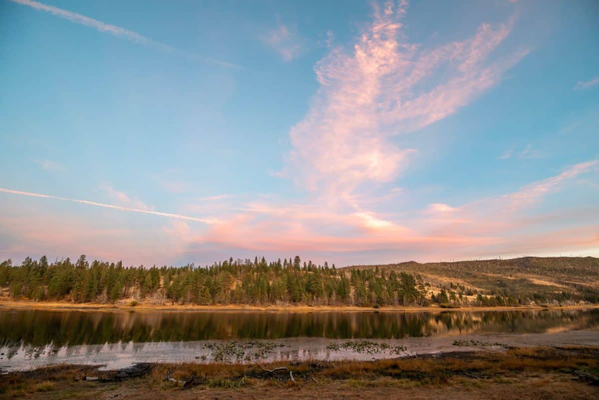 Dog Lake at Sunset seen from the campground. This destination is in Lake County outside Lakeview, Oregon