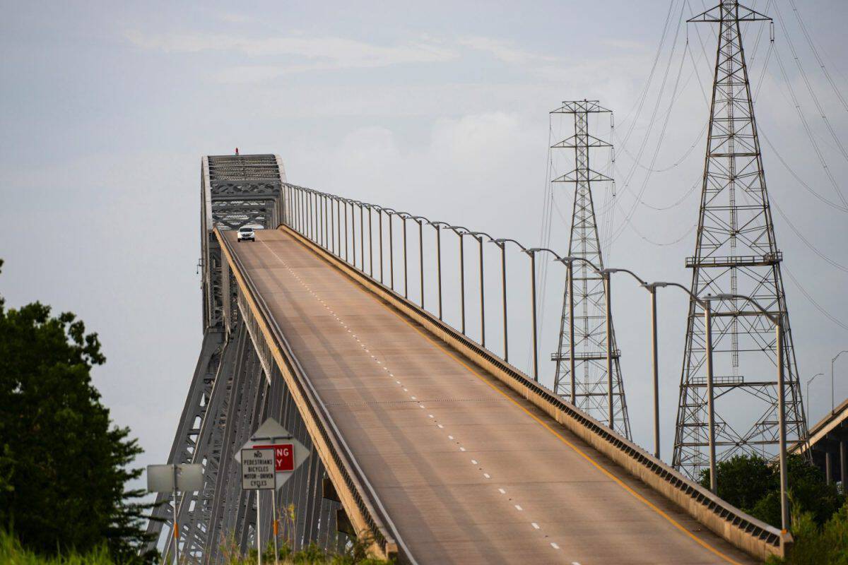 Bridge City, Texas, USA, - 2020: The Rainbow Bridge crossing the Neches River in Southeast Texas. Dangerous road, the Scariest Bridge In US. Cool tourist destination