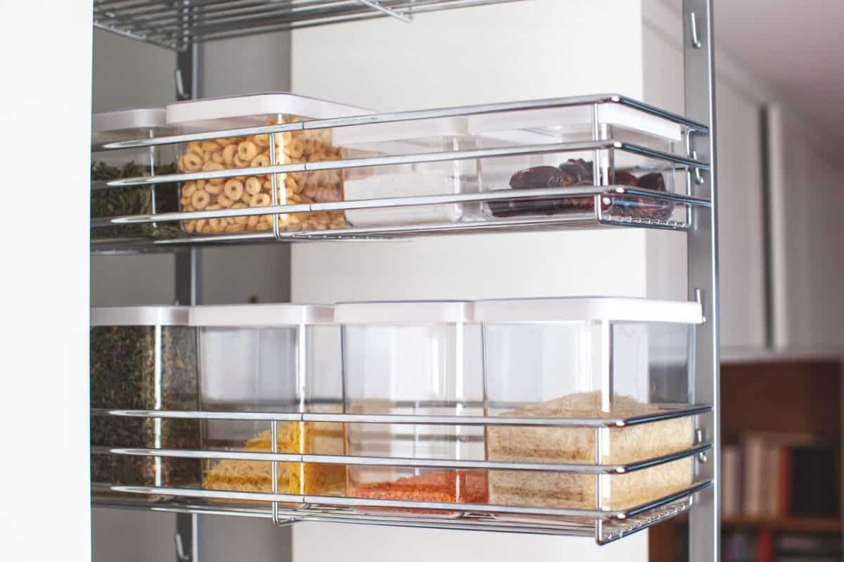 Pantry in the kitchen. Organization system. An organized pantry will help to keep clutter off of your counters.