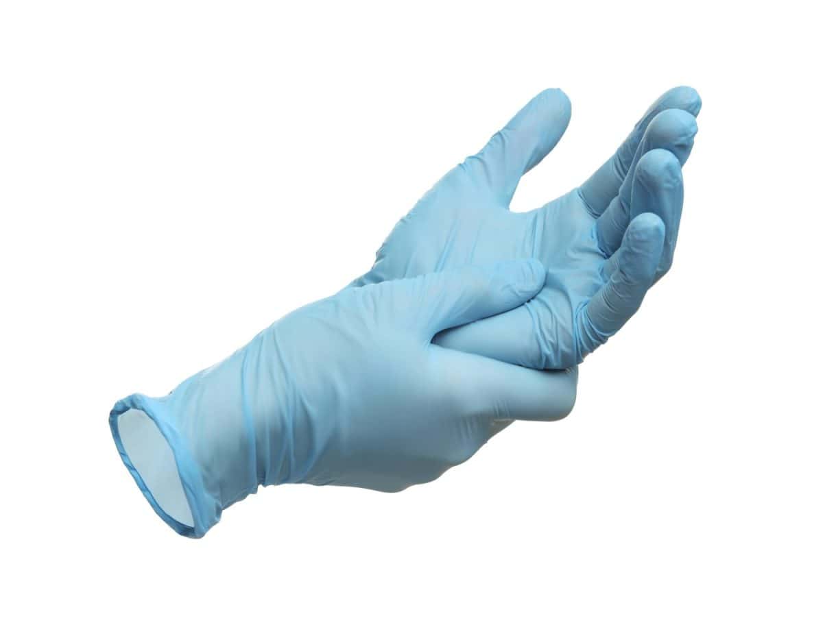 Pair of medical gloves isolated on white