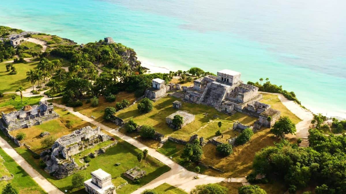 Drone shot Ruins of Tulum, Mexico overlooking the Caribbean Sea in the Riviera Maya Aerial View. Tulum beach Quintana Roo Mexico. White sand beach background