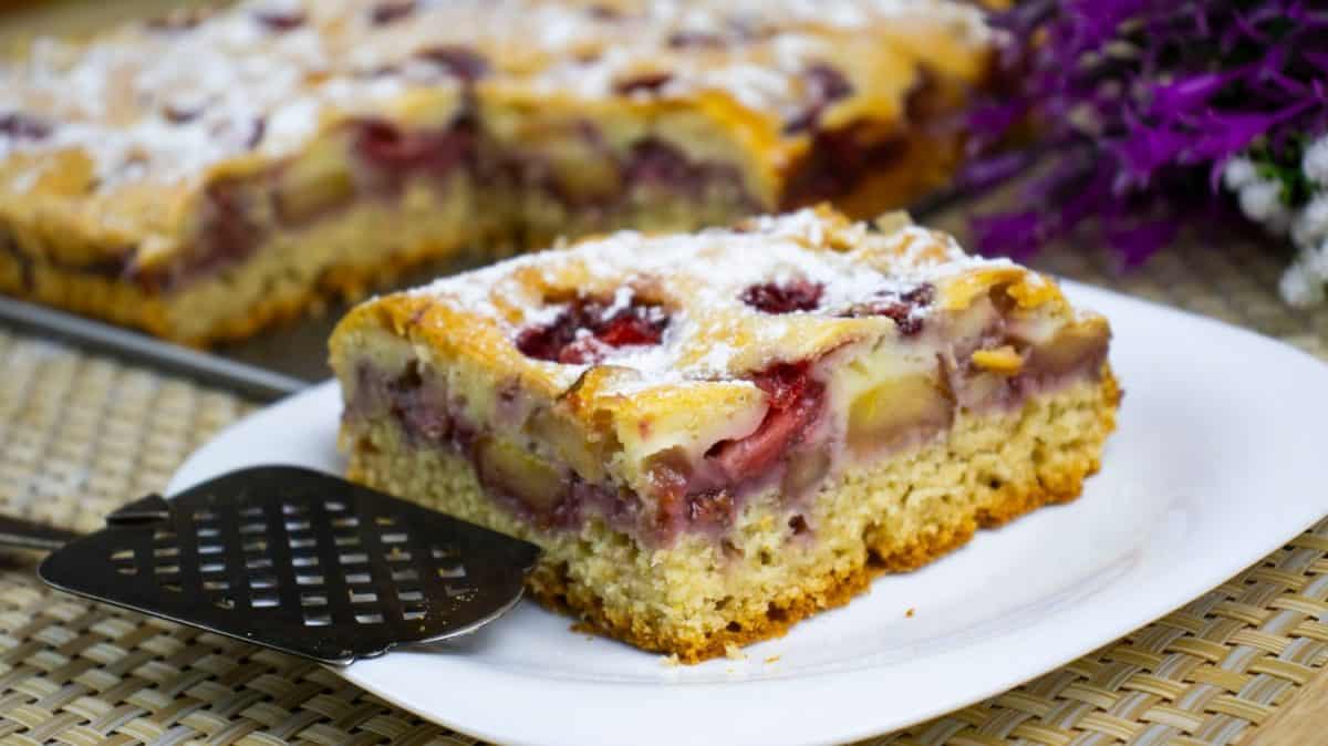 A Slice Of Homemade Strawberry Rhubarb Cake Ready For The Taking