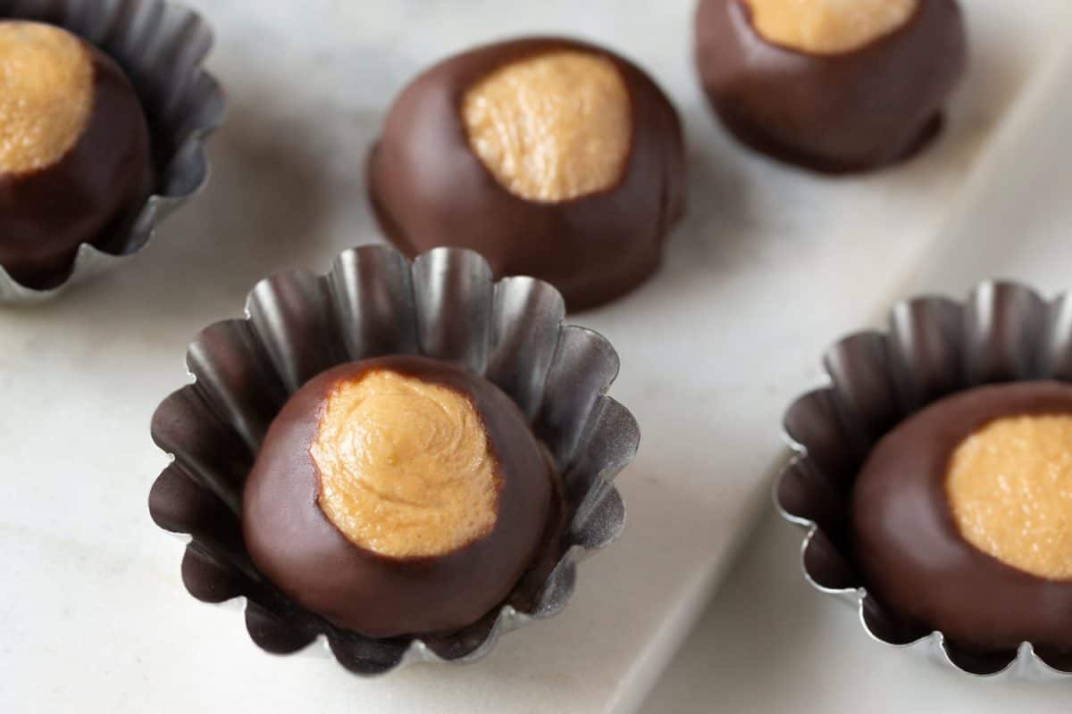 Smooth and Creamy Buckeye Chocolate and Peanut Butter Candies Chocolates on White Background