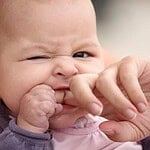 Apply Pressure to Your Baby's Gums