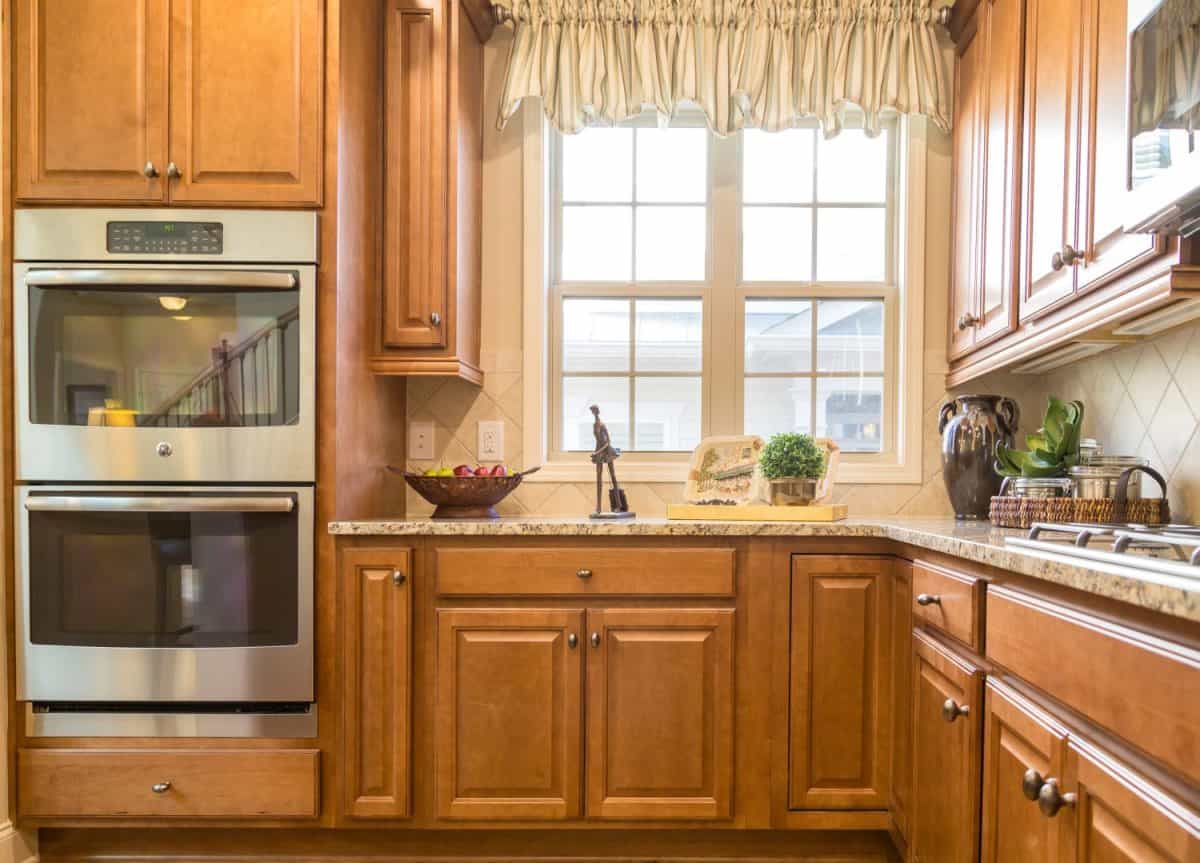 Double Ovens in Wood Cabinets in new kitchen