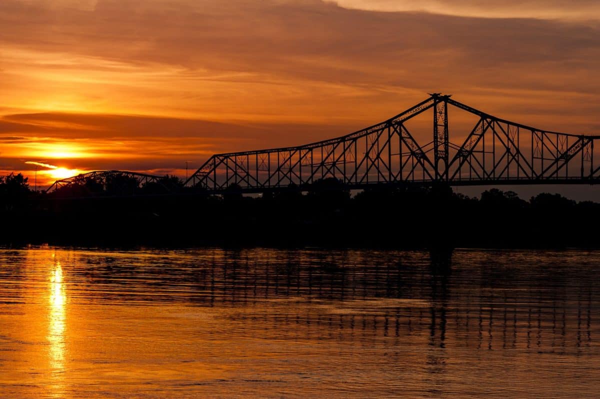 A sunset view of the historic Ironton-Russell cantilever through truss bridge that crossed the Ohio River between Ironton, Ohio and Russell, Kentucky.