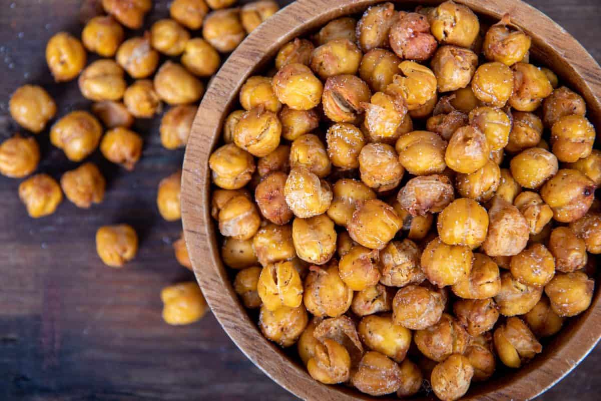 Roasted salt Seasoned Chick Peas healthy snack on wooden table