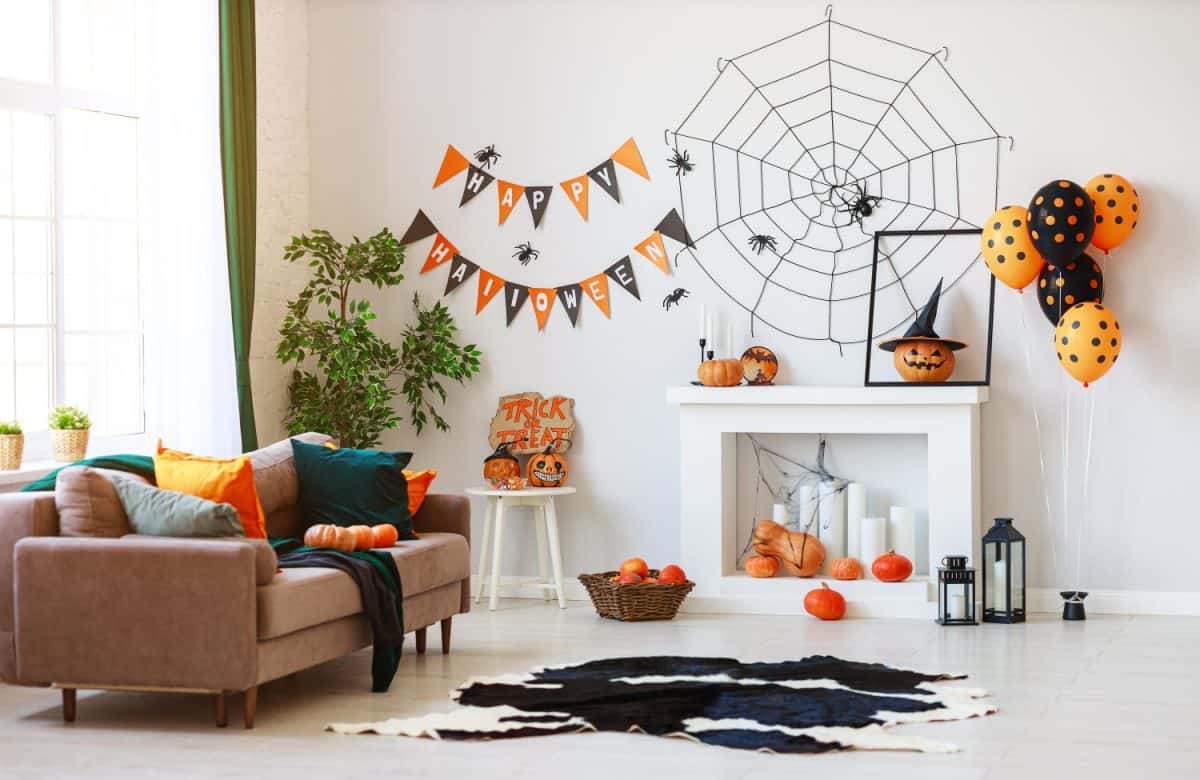 interior of the house decorated for Halloween pumpkins, webs and spiders