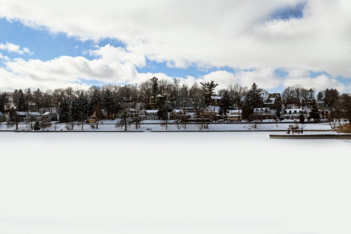 Frozen Hiawatha Lake inside Upper Onondaga Park in the Strathmore neighborhood of Syracuse, New York