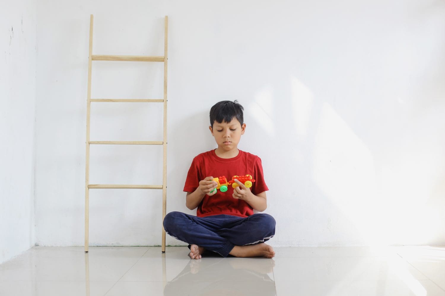 Sad and bored autistic child for being alone playing with toys. Childhood traumatic experience, psychology, psychological, asperger syndrome, asperger's disorder, autistic, autism. 10 signs your child may have asperger's