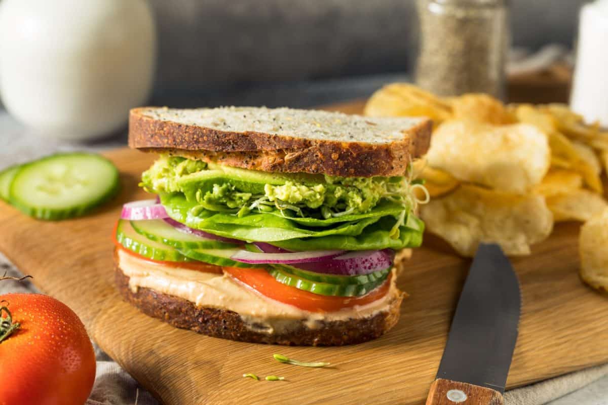 Homemade Mediterranean Veggie Hummus Sandwich with Tomato and Cucumber