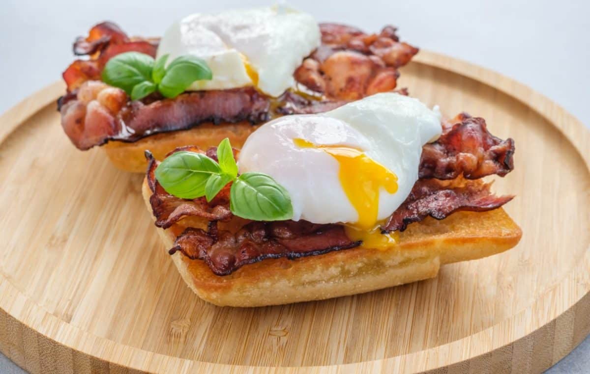 Ciabatta sandwich with poached egg and bacon