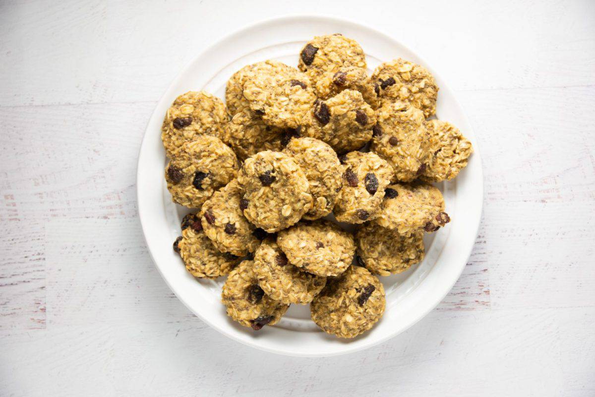 Plate of homemade banana oatmeal raisin cookie - healthy, vegetarian, sugar-free and gluten-free baby food