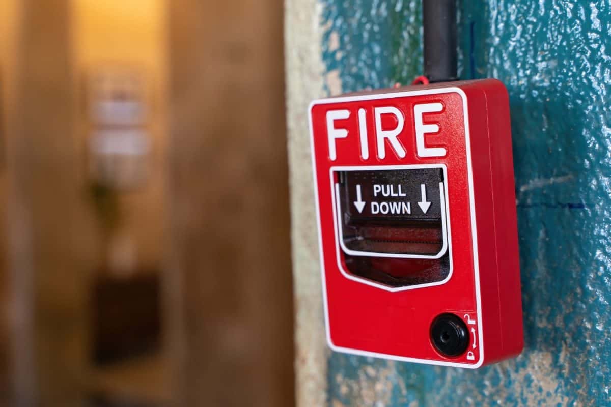 Closed-up of Fire alarm press machine. Fire alarm switch on the wall, Fire warning equipment for emergency. Founded un everywhere for the public area.