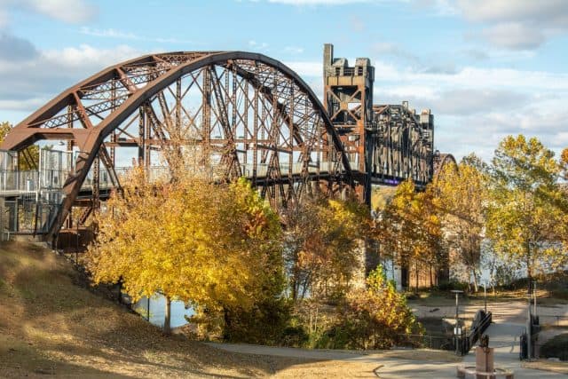 The historic 1899 Rock Island Railroad Bridge converted into a pedestrian bridge across the Arkansas River between downtown Little Rock and North Little Rock, Pulaski County, Arkansas, USA