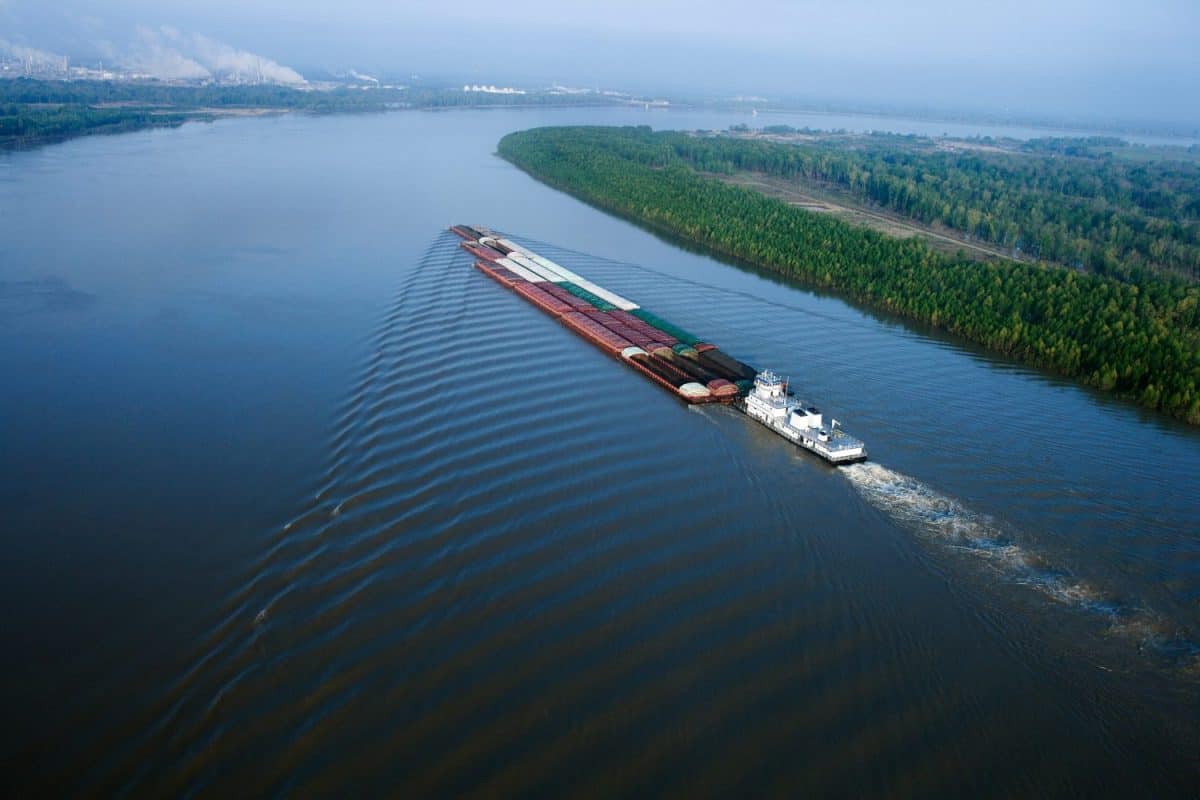 Aerial of barge on Mississippi River in Baton Rouge, Louisiana.