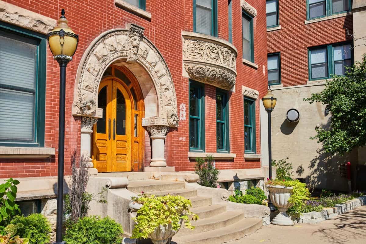 Historic Red Brick Building with Yellow Arched Door, Indianapolis