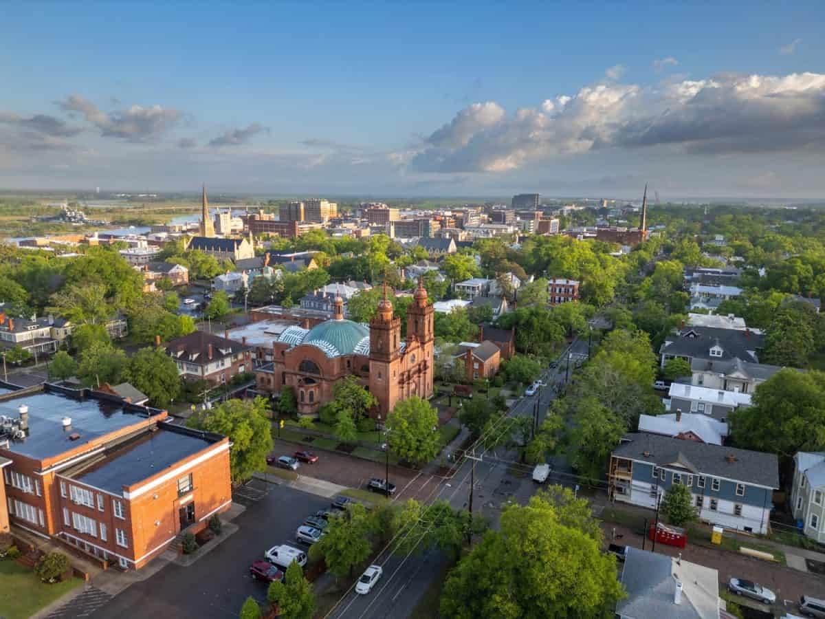 Wilmington, North Carolina, USA historic churches and downtown viewed from above.