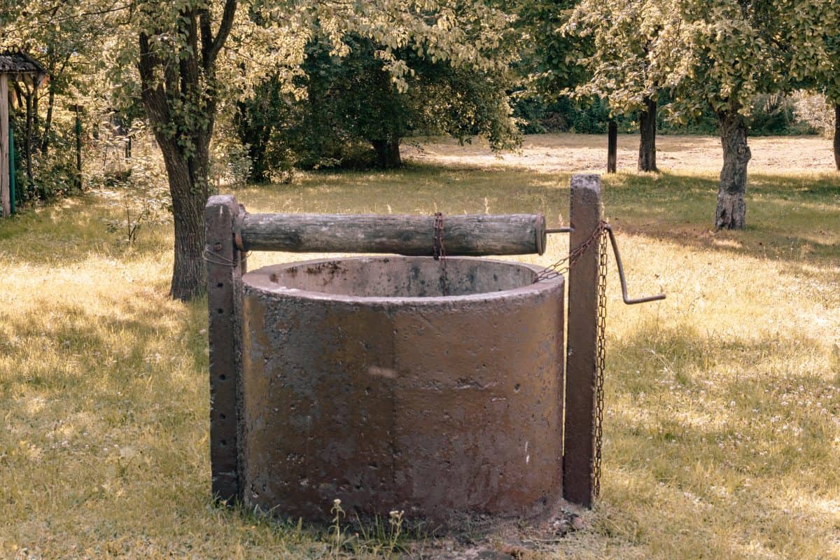 old well,ancient draw-well in the european countryside