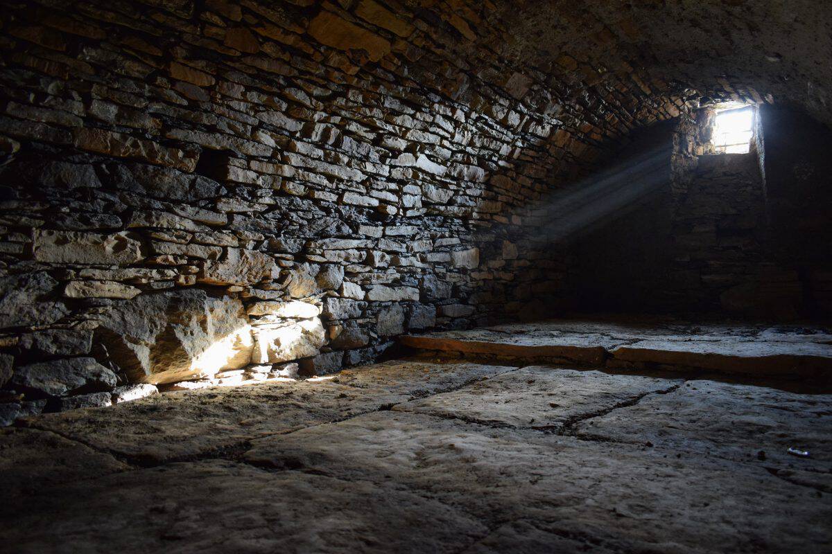 Rays of light shining into the old cellar