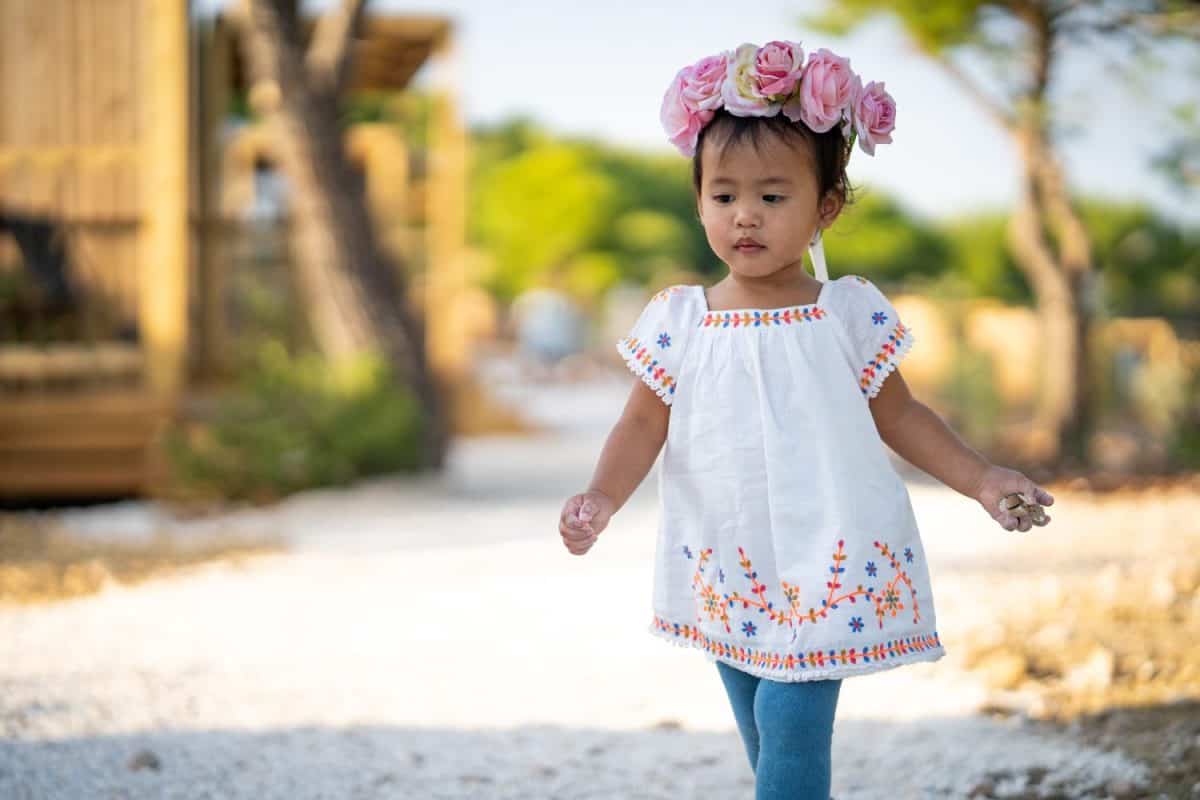 Cute little girl playing around at Obonjan Croatian island