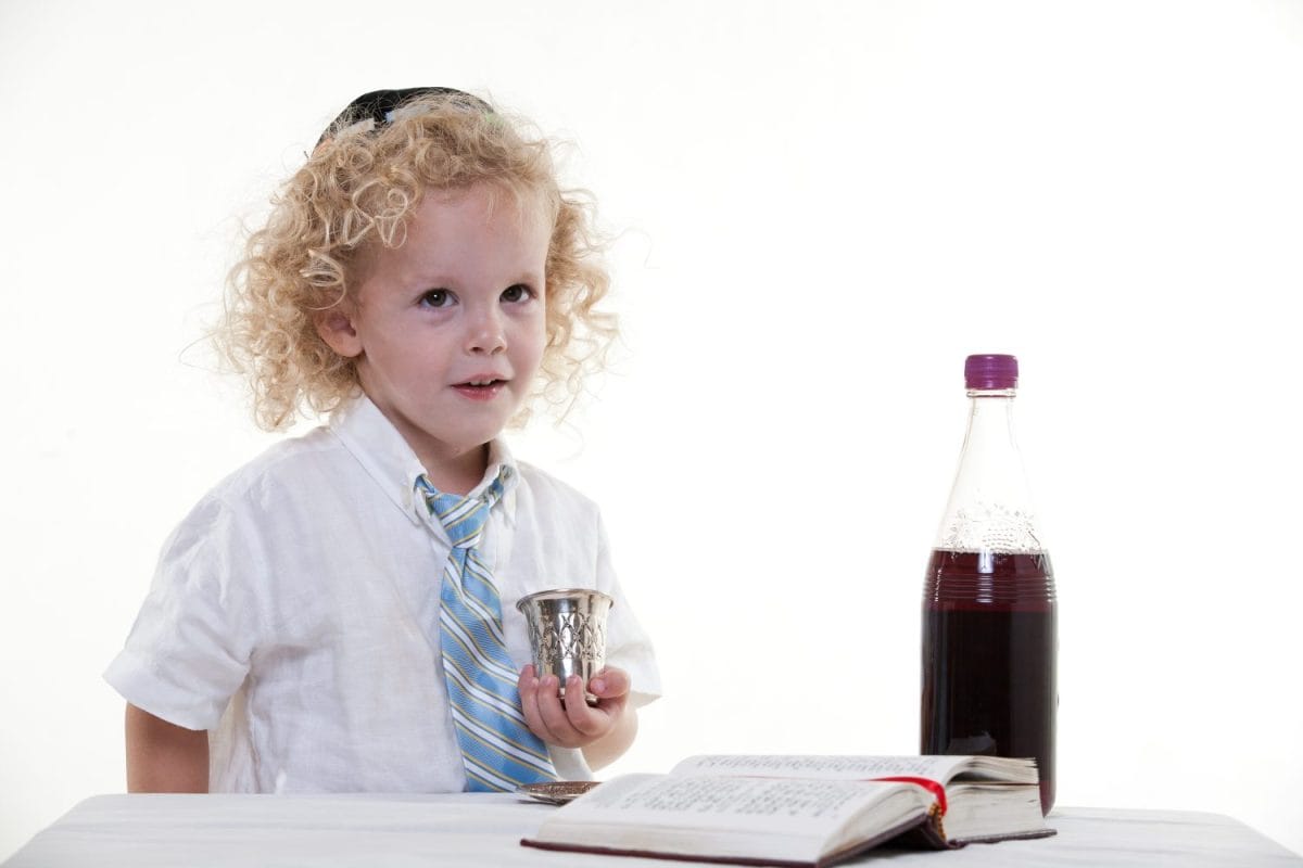 Young curly haired jewish caucasian toddler boy