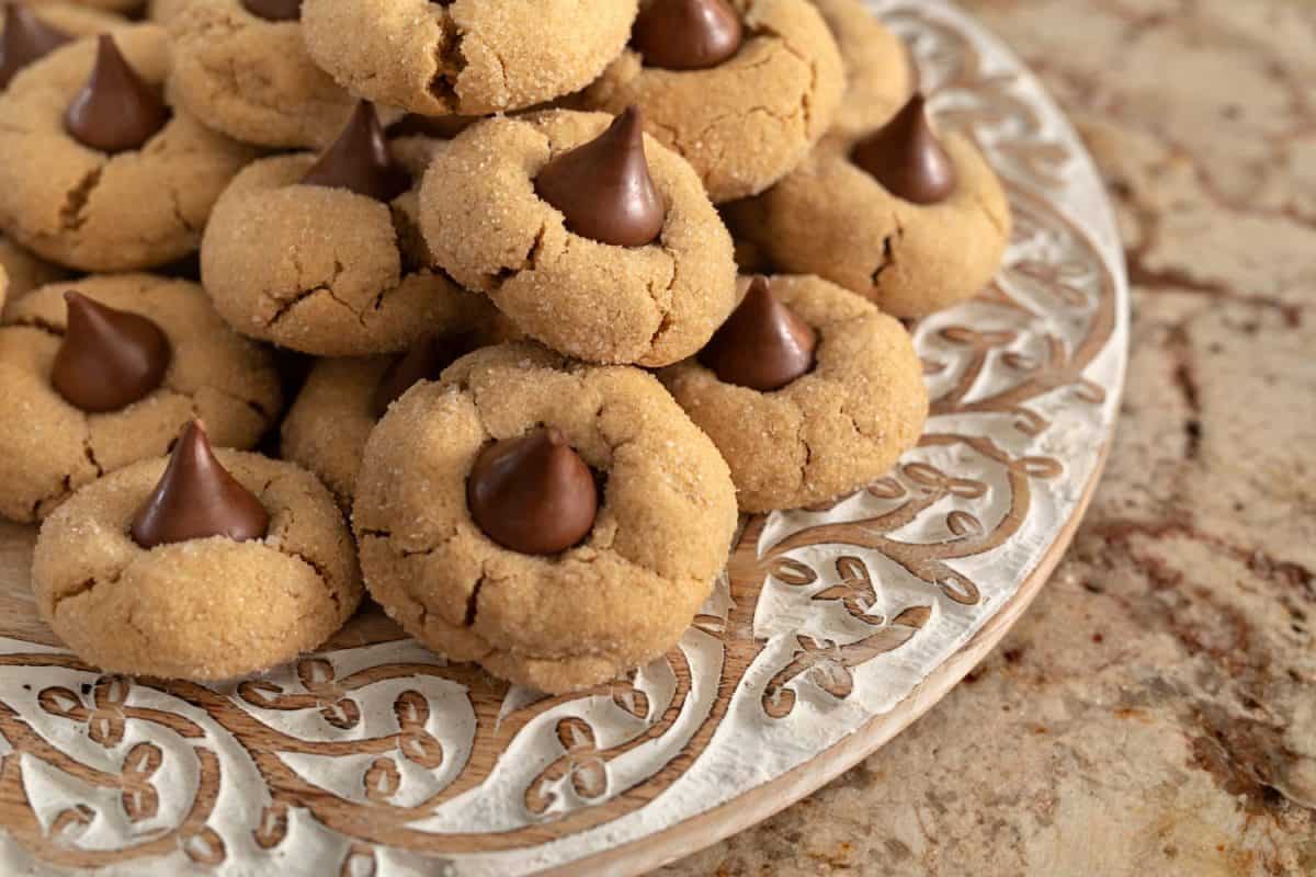 peanut butter blossoms on wood plate