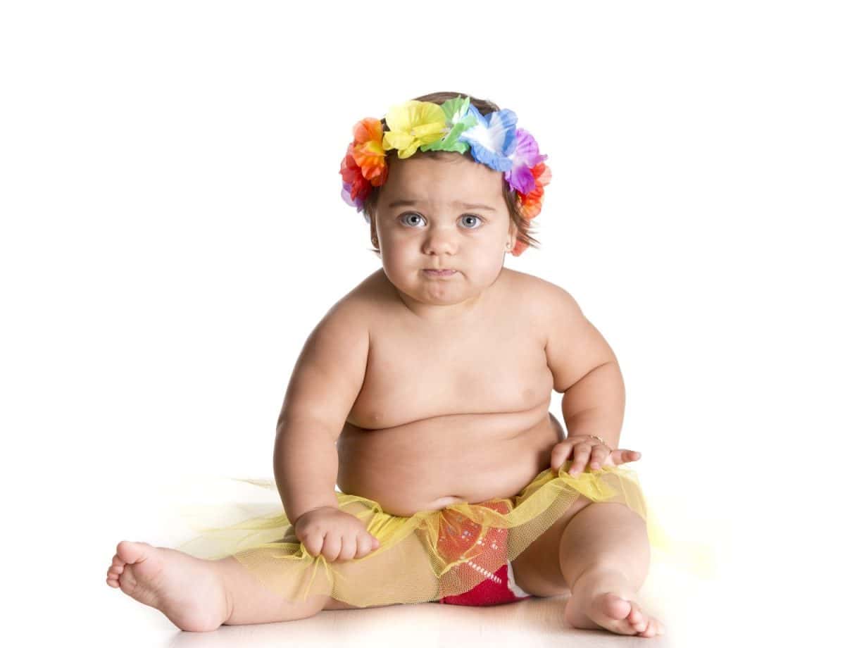 one little girl dressed in a Hawaiian crown