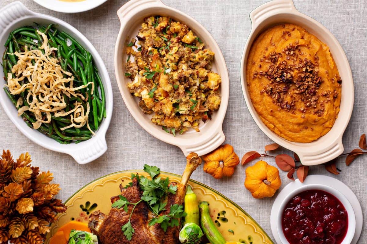 Traditional Thanksgiving sides, green beans casserole, stuffing and sweet potatoes