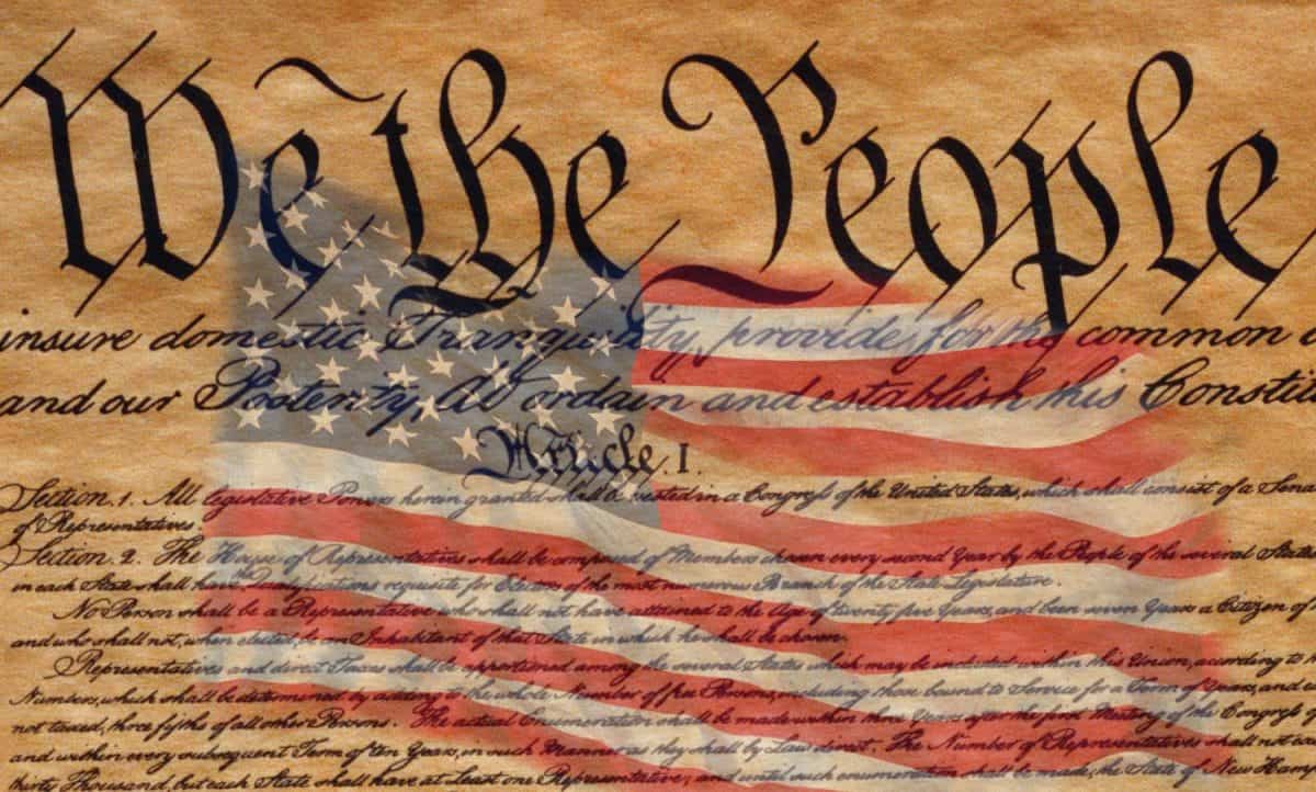 This is the preamble to the U.S. Constitution that starts with the words, we the people - and US Flag superimposed over it.