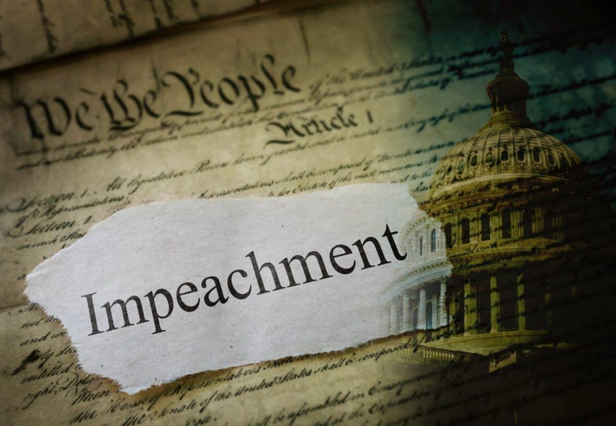 Impeachment news headline with US Capitol and United States Constitution text