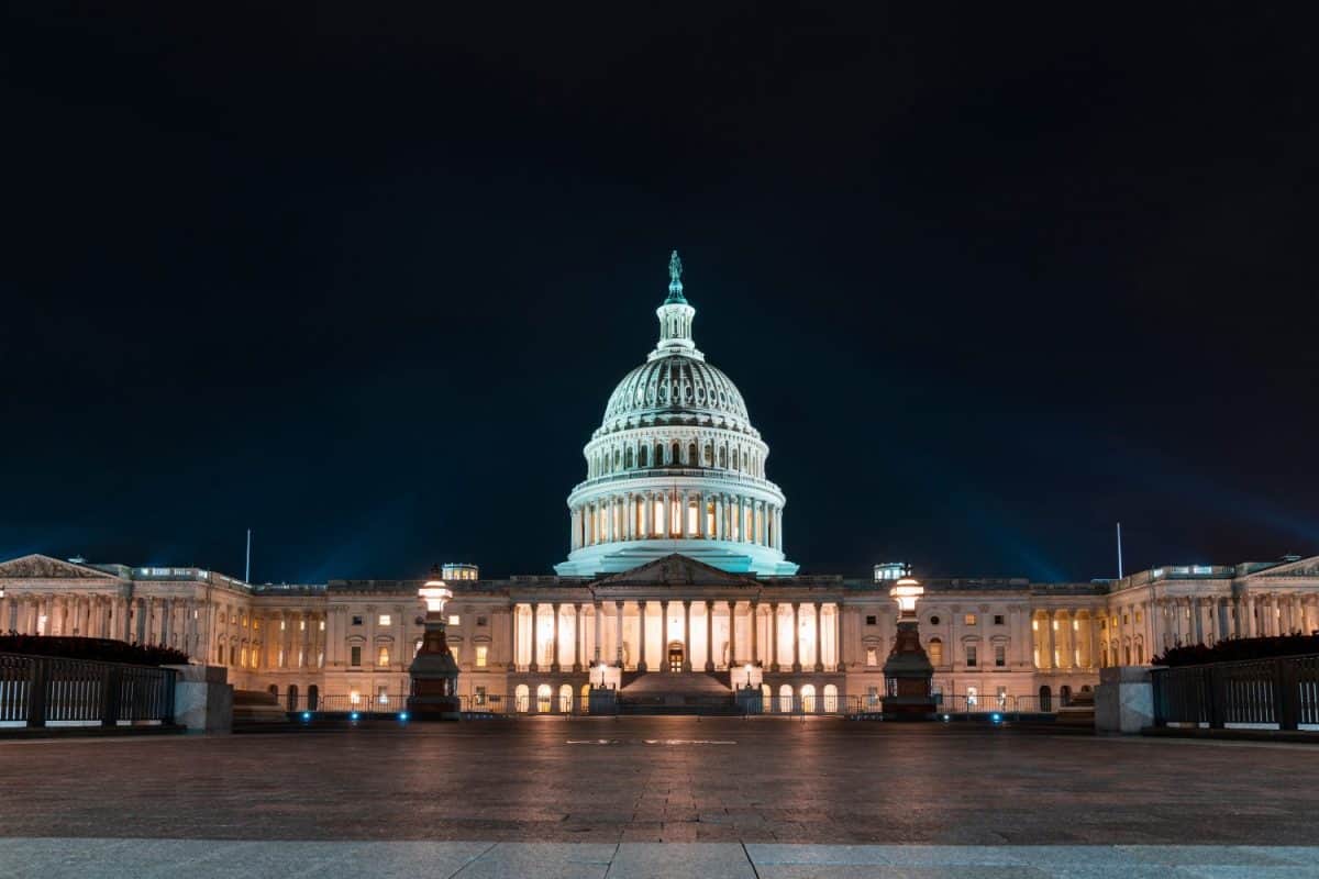 Front view of the Capitol dome building at night, Washington DC, USA. Illuminated Home of Congress and Capitol Hill. The concept of legislative branch of American political system