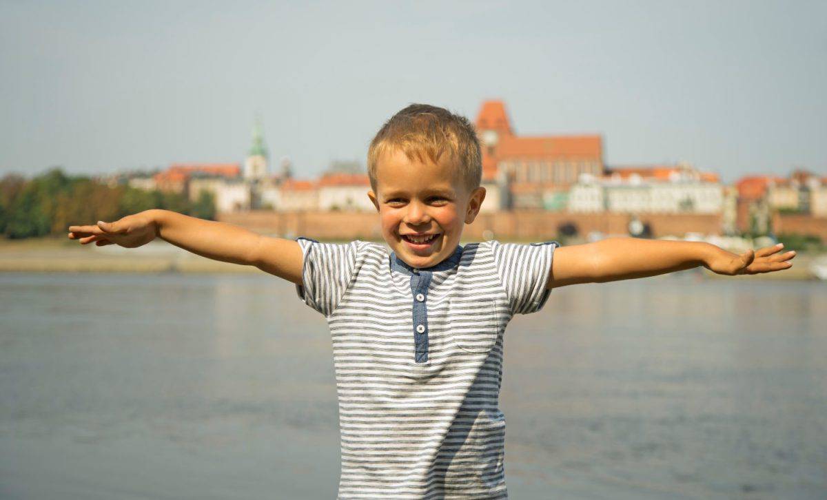 Child at riverbank of Vistula in Torun. Poland