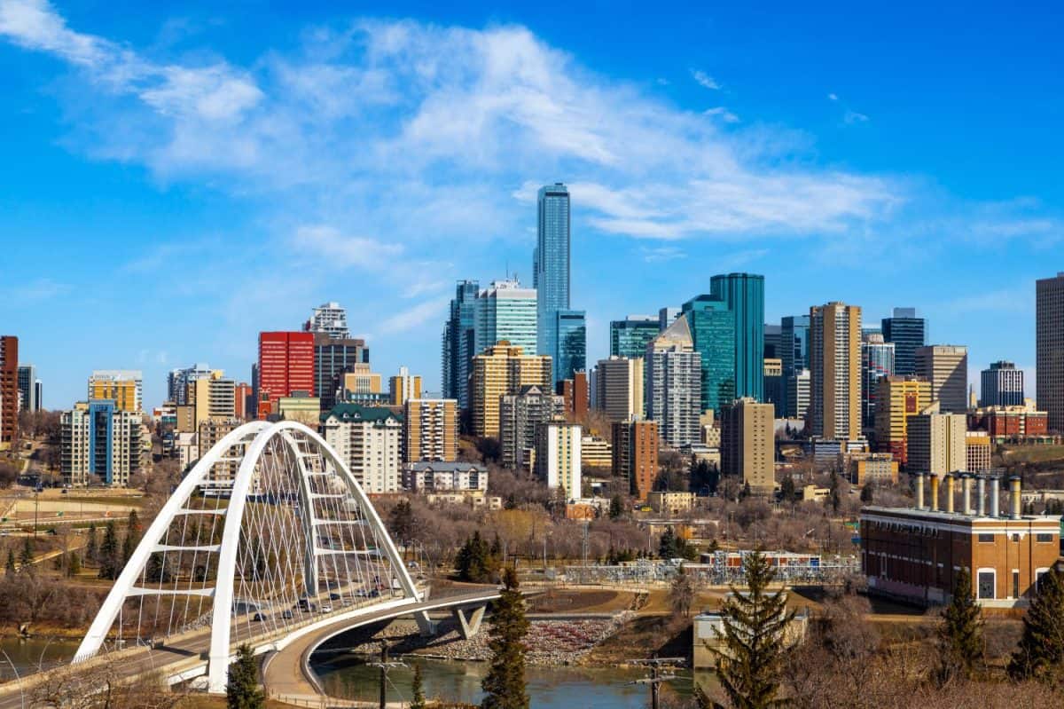 Edmonton downtown skyline showing Walterdale Bridge across Saskatchewan River and surrounding skyscrapers. Edmonton is the capital of Alberta, Canada.