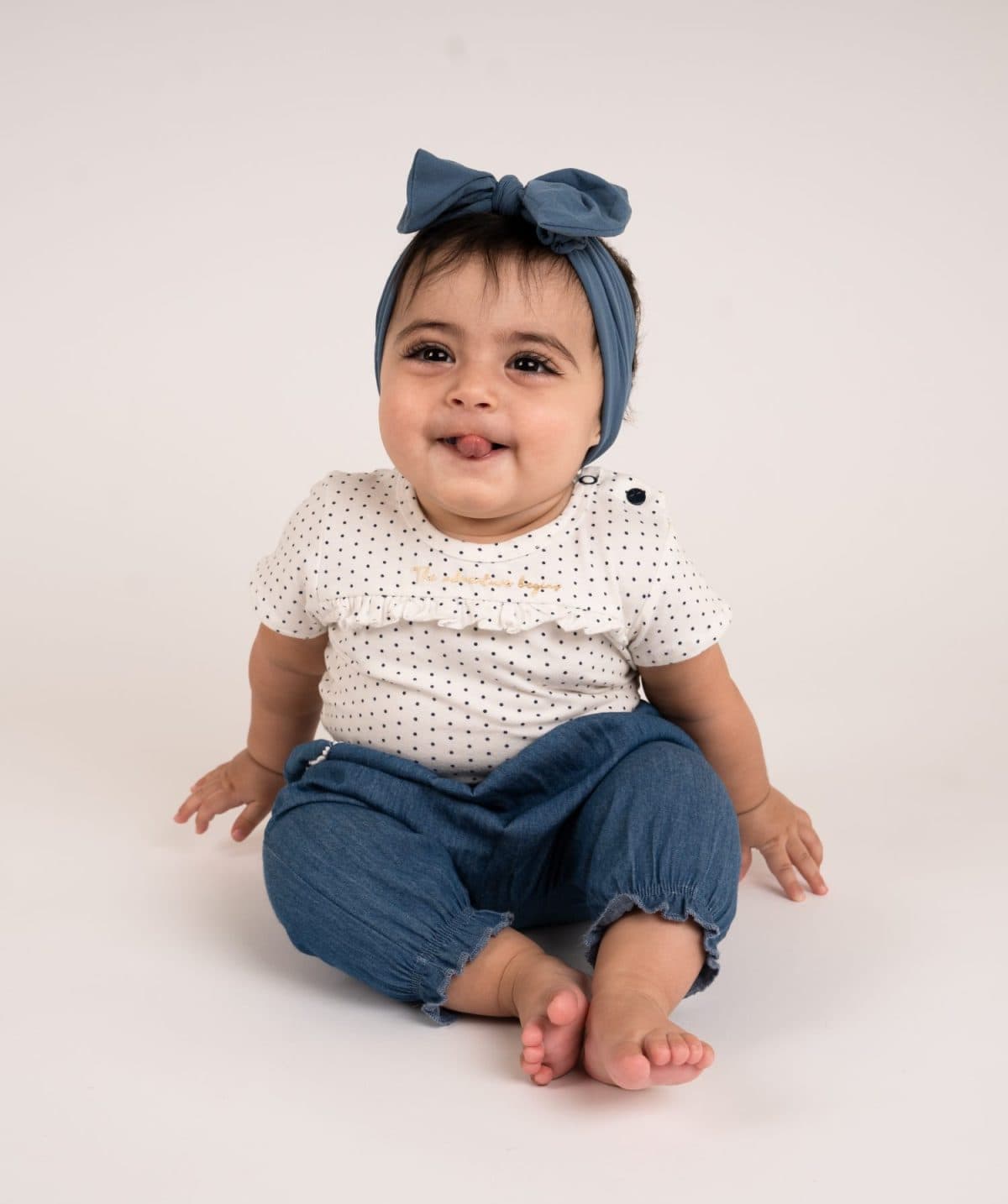 7 months baby girl posing in studio