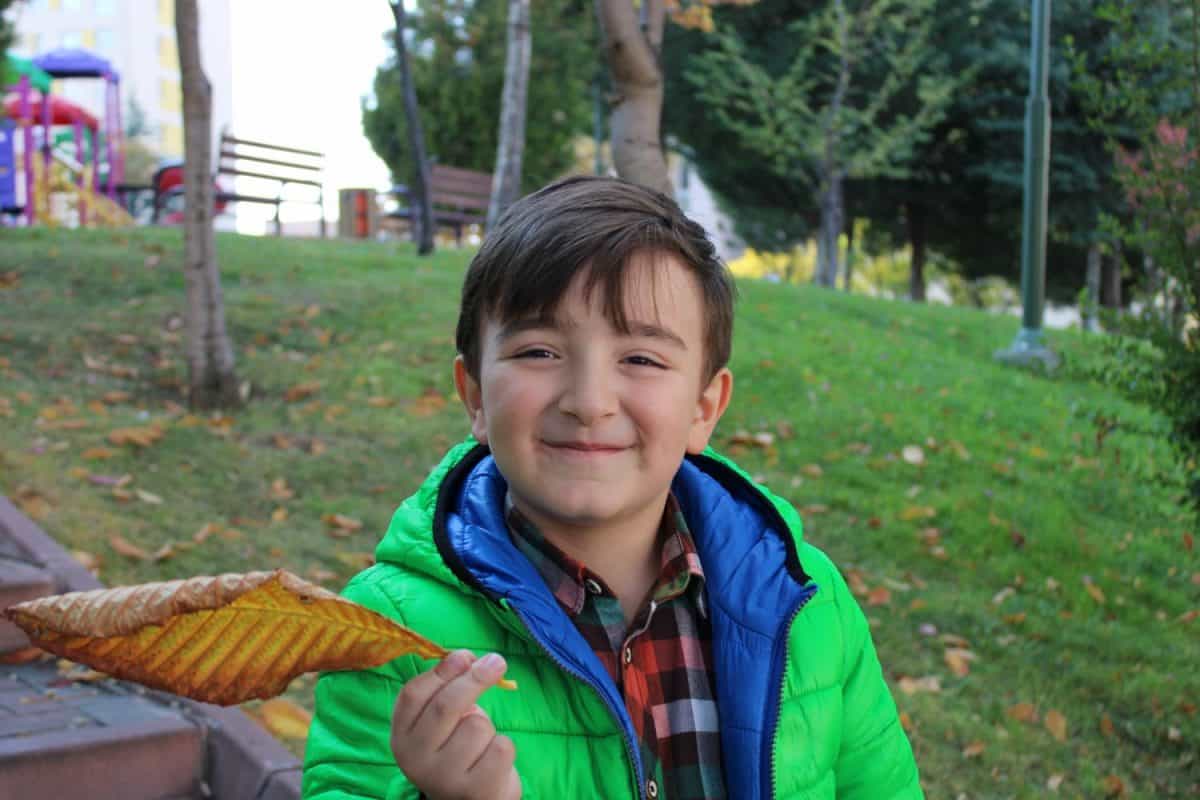 A happy and sweet Turkish boy. peaceful and handsome face. happiness. Selective Focus child face.