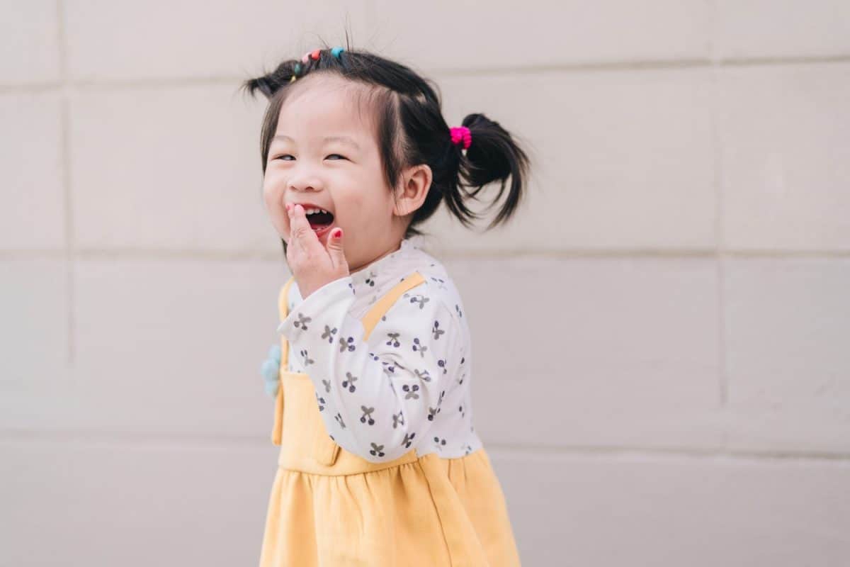 Cute little girl Asian happiness shot outdoors, 2-3 year old